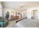 Comfortable bedroom featuring a sitting area, lots of storage and neutral decor at 14710 W Yosemite Dr, Sun City West, AZ 85375