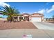 Charming single story home featuring a 2-car garage, well manicured landscaping, and a red tile roof at 14710 W Yosemite Dr, Sun City West, AZ 85375