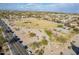 Aerial view of a community park featuring open spaces, trees, and walking trails, promoting outdoor activities at 1473 E Mead Dr, Chandler, AZ 85249