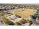 Aerial view of a community park featuring open spaces, trees, and walking trails, promoting outdoor activities at 1473 E Mead Dr, Chandler, AZ 85249