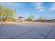 Well-maintained basketball court featuring a hoop, recreational space for active fun and community interaction at 1473 E Mead Dr, Chandler, AZ 85249