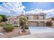 Charming two-story home with desert landscaping including a majestic palm tree at 1473 E Mead Dr, Chandler, AZ 85249