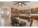 Open kitchen and dining area featuring custom cabinetry and a large island at 1473 E Mead Dr, Chandler, AZ 85249