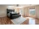 Relaxing main bedroom with dark wood furniture, ceiling fan, and natural light at 1473 E Mead Dr, Chandler, AZ 85249