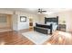 Bright main bedroom featuring a dark wood bed frame, rug and bench at 1473 E Mead Dr, Chandler, AZ 85249