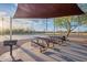 Covered picnic area features tables and a grill, offering a perfect spot for outdoor gatherings and casual dining at 1473 E Mead Dr, Chandler, AZ 85249