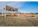 Vibrant playground featuring swings, climbing structures, and shade canopies for a fun, safe play experience at 1473 E Mead Dr, Chandler, AZ 85249