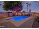 Beautiful pool and patio area with trees, umbrellas, lounge chairs, and a diving board at 1473 E Mead Dr, Chandler, AZ 85249