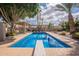 Inviting pool and large, shady trees create a backyard oasis at 1473 E Mead Dr, Chandler, AZ 85249