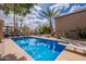 Relaxing pool offers a diving board, desert landscaping, and a pergola-covered lounge area at 1473 E Mead Dr, Chandler, AZ 85249