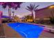 Gorgeous backyard pool area complete with diving board, desert plants, and patio area at 1473 E Mead Dr, Chandler, AZ 85249