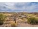 Scenic aerial view of a home surrounded by lush greenery and desert landscapes at 16203 E Ridgeline Dr, Fountain Hills, AZ 85268