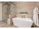 Modern bathroom featuring a soaking tub and separate glass-enclosed shower at 16203 E Ridgeline Dr, Fountain Hills, AZ 85268