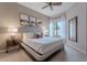 Serene bedroom with a cozy bed, neutral walls, and a ceiling fan at 16203 E Ridgeline Dr, Fountain Hills, AZ 85268