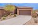 Single-Gathering home with a desert landscape and a two-car garage at 16203 E Ridgeline Dr, Fountain Hills, AZ 85268