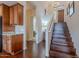 Beautiful interior with wood floors and stairs, leading up to the home's entry at 16203 E Ridgeline Dr, Fountain Hills, AZ 85268