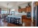 Kitchen features stainless steel appliances, granite countertops, breakfast bar and wood floors at 16203 E Ridgeline Dr, Fountain Hills, AZ 85268