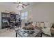 Cozy living room featuring a comfortable sofa and a built-in bookcase at 16203 E Ridgeline Dr, Fountain Hills, AZ 85268