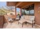 Relaxing outdoor patio space with comfortable seating and desert views at 16203 E Ridgeline Dr, Fountain Hills, AZ 85268