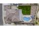 Expansive aerial view of backyard featuring pool, lush lawn, and well-maintained landscaping at 16606 S 15Th Ln, Phoenix, AZ 85045