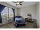 Comfortable bedroom with blue curtains and accents and lots of natural light at 16606 S 15Th Ln, Phoenix, AZ 85045