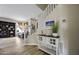 Inviting entryway with wood floors, a staircase, and a charming console table with beach-themed decor at 16606 S 15Th Ln, Phoenix, AZ 85045