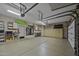 Clean and organized garage space with epoxy floors and plenty of storage cabinets at 16606 S 15Th Ln, Phoenix, AZ 85045