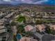 Gorgeous desert home with a pool, putting green, and lush landscaping, set against a scenic backdrop of mountains at 16646 S 16Th St, Phoenix, AZ 85048