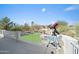 Backyard with pool, putting green and mountain views, and a telescope for stargazing at 16646 S 16Th St, Phoenix, AZ 85048