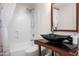 Bathroom featuring a sink, countertop, mirror, shower, and tub at 16646 S 16Th St, Phoenix, AZ 85048