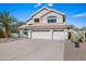 Lovely two-story home featuring a spacious three-car garage and well-maintained front yard at 16646 S 16Th St, Phoenix, AZ 85048