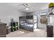 Cozy bedroom featuring a ceiling fan and bunk beds at 17574 W Corrine Dr, Surprise, AZ 85388