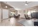 Inviting dining area with modern decor, high ceilings, and a ceiling fan at 17574 W Corrine Dr, Surprise, AZ 85388