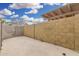 Fenced backyard with a concrete floor at 1817 W Claremont St, Phoenix, AZ 85015