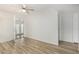 Bedroom with wood-look floors and sliding door access to outdoor area at 1817 W Claremont St, Phoenix, AZ 85015