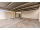 Wide-angle view of the covered parking area with block wall and access to wooden door at 1817 W Claremont St, Phoenix, AZ 85015