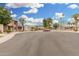 Scenic street view showcasing the community's well-maintained landscaping and charming homes at 1817 W Claremont St, Phoenix, AZ 85015