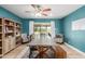 Dining room with large table, chairs, bench, and a sliding door leading to the outside at 1824 W State Ave, Phoenix, AZ 85021