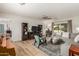 Cozy living room features a sectional sofa, entertainment center, and natural light at 1824 W State Ave, Phoenix, AZ 85021