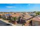 Aerial view of the homes in a well-maintained neighborhood with desert landscaping at 18259 W Buena Vista Dr, Surprise, AZ 85374