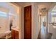 Bathroom view showcasing the vanity, toilet, and shower/tub with a decorative shower curtain at 18259 W Buena Vista Dr, Surprise, AZ 85374