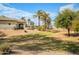 Expansive lawn area with shade ramada and desert landscaping, perfect for outdoor activities at 18259 W Buena Vista Dr, Surprise, AZ 85374