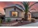 Charming single-story home with a well-manicured front yard with rock landscaping and shutters at 18259 W Buena Vista Dr, Surprise, AZ 85374