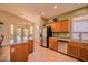 Spacious kitchen featuring stainless steel appliances, granite countertops, and an island at 18259 W Buena Vista Dr, Surprise, AZ 85374