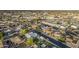 Wide aerial view showcasing a neighborhood with well-maintained homes and tree-lined streets at 1849 E 2Nd Pl, Mesa, AZ 85203