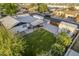 Aerial view of a home with a large backyard, covered patio, and a detached garage at 1849 E 2Nd Pl, Mesa, AZ 85203