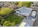 Aerial view of a large, well-maintained backyard with lush lawn and patio area, perfect for outdoor living at 1849 E 2Nd Pl, Mesa, AZ 85203