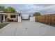 Wide driveway with gate leading to the backyard and house at 1849 E 2Nd Pl, Mesa, AZ 85203