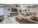 Relaxing living room with a sectional, modern fireplace, and entertainment center at 1849 E 2Nd Pl, Mesa, AZ 85203