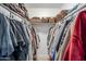 Organized walk-in closet featuring shelving and hanging space for clothing and accessories at 1849 E 2Nd Pl, Mesa, AZ 85203